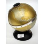 A FLEETWOOD LATE 20TH CENTURY TRANSISTOR RADIO in the form of a globe, 21cm high