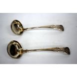 A PAIR OF SCOTTISH QUEENS PATTERN SILVER SAUCE LADLES with marks for Edinburgh, one dated 1841 the