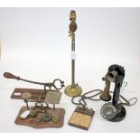 AN OLD BLACK LACQUERED CANDLESTICK TYPE TELEPHONE set up as a telephone demonstration set together