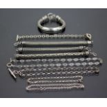 A GROUP OF SILVER AND WHITE METAL NECKLACES and bracelets (9)