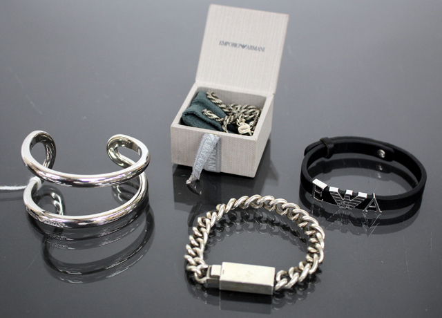 AN EMPORIO ARMANI HEAVY SILVER BRACELET with original presentation case together with a further