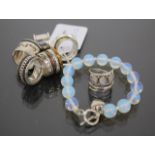 A GROUP OF SIX VARIOUS DECORATIVE RINGS together with a beaded bracelet (7)