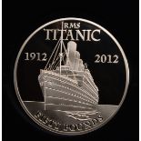 A SILVER FIFTY POUND COIN commemorating the centenary of the sinking of the Titanic, 9.7cm