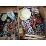 A QUANTITY OF VARIOUS COSTUME JEWELLERY, necklaces, with a silver photograph frame etc