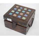 A SMALL WOODEN CASKET containing a quantity of various jewellery to include pearl bracelets,