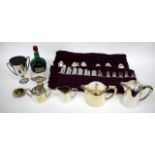A SILVER PLATED TROPHY CUP together with a small quantity of silver plate and a part canteen of