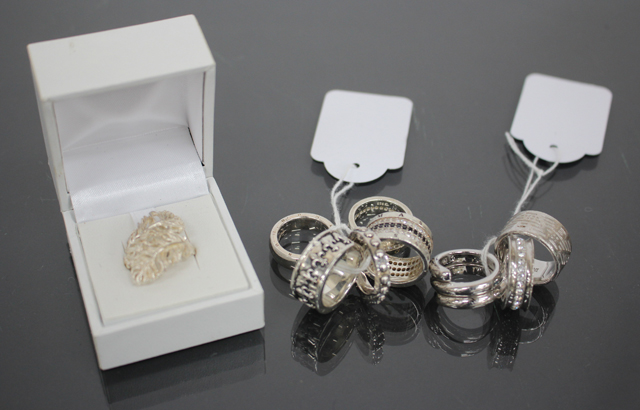 A GROUP OF THREE VARIOUS EMPORIO ARMANI SILVER RINGS together with a group of six various silver