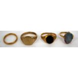 A 22 CARAT GOLD WEDDING BAND, 9 carat gold signet ring, an 18 carat gold opal set ring and a further