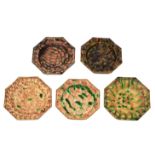 A GROUP OF FIVE WHEILDON TYPE OCTAGONAL DISHES with varying polychrome decoration and gadrooned