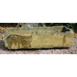 A RECTANGULAR CARVED STONE TROUGH (AF) 118cm long