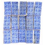 A GROUP OF VICTORIAN BLUE AND WHITE POTTERY TILES with stylized flower decoration, each