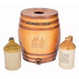 A DOULTON & WATTS STONEWARE WHISKEY BARREL, 45.5cm high; and two stoneware brewery jars, for J