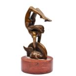 E LOISEAU BRONZE CAR MASCOT in the form of a nude female acrobat performing a hand stand on top of a