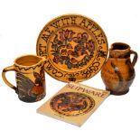 A SLIPWARE CHARGER by Mary Wondrausch, the border with motto 'Comfort me with Apples' 30cm diameter,