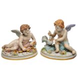 A PAIR OF CAPO DI MONTE PORCELAIN FIGURINES one of Cupid the other of Psyche, each on an oval base
