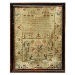 A GEORGE III SAMPLER worked by Hannah Mendham with mottos above vignettes of deer and vases of