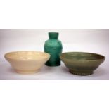 A SUSIE COOPER GREEN GLAZED VASE ref No. 444 26cm in height together with two similar Susie Cooper