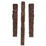 THREE CARVED OAK ELEMENTS in the form of caryatids, the longest 93cm tall