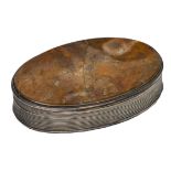 A GEORGE IV OVAL SILVER AND HARDSTONE SET SNUFF BOX with reeded edge and marks for Birmingham 1829