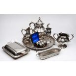 A COLLECTION OF SILVER PLATE to include a three piece tea service, a set of napkin rings in case,