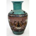 A VIETNAMESE TURQUOISE GLAZED TERRACOTTA FLOOR VASE of baluster form and decorated with dragons