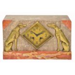 A FRENCH ART DECO MANTLE TIMEPIECE, the rectangular polished marble case mounted with stylized