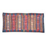 AN ANTIQUE ANATOLIAN WOVEN WOOL KELIM with polychrome banded geometric decoration, 420cm x 168cm