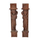TWO ANTIQUE CHESTNUT WOOD CARVINGS depicting male figures, each 77cm in height