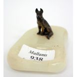 A SMALL ONYX PIN TRAY mounted with a cold painted bronze sculpture of an Alsatian, 8.5cm wide