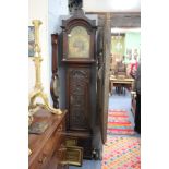 AN ANTIQUE OAK LONGCASE CLOCK the eight day movement with brass dial signed Thos Binks,