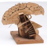 A CARD MODEL OF THE HUMAN BRAIN on a wooden plinth base, 23cm high