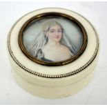 A 19TH CENTURY CYLINDRICAL IVORY BOX AND COVER inset with a miniature portrait of Agnes Sorel, 8cm