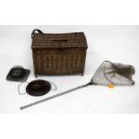 AN OLD BASKET WORK CREEL with a hinged lid and leather and canvas strap, 57cm wide together with a