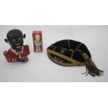 A REPRODUCTION MONEY BOX, patent 601362 together with a felt 1927-28 cap, Midgleys novelty soap (3)