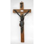 A CARVED HARDWOOD FIGURE OF CHRIST ON THE CROSS, 39cm in length