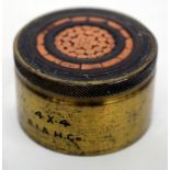 A SMALL PAPERWEIGHT made with a cross section of under sea cable, marked to the edge 4X4 B.I & H.Co