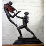 A BRONZE SCULPTURE OF TWO BALLET DANCERS mid leap, mounted on a shaped stone base, 60cm high