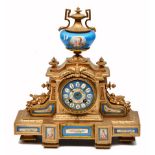 A 19TH CENTURY FRENCH GILT 8 DAY MANTLE CLOCK with blue enamelled dial and Roman numerals and having