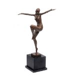 A CONTEMPORARY BRONZE SCULPTURE OF A 1920'S STYLE DANCING GIRL, mounted on a turned marble socle,