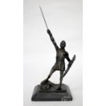 A BRONZE SCULPTURE OF A KNIGHT pointing his sword into the sky, on a rectangular hardstone base,