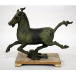 A BRONZE SCULPTURE OF A RUNNING HORSE, after the Chinese antique, 27cm high and mounted on a