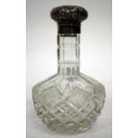 A VICTORIAN HOBNAIL CUT GLASS SCENT BOTTLE with long neck and silver lid, 16.5cm high