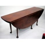 A MODERN YEW WOOD DROP LEAF WAKE TABLE with turned tapering legs terminating in pad feet, 196cm long