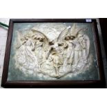 E.HALSE, An early 20th century plaster wall plaque depicting angels, signed and dated 1917, 40cm x