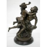 A FRENCH BRONZE BACCHANTES GROUP on a cylindrical hardstone base having a bronze Garanti Paris J.