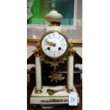 A LATE 19TH/EARLY 20TH CENTURY CONTINENTAL DRUM CLOCK, the gilt brass case on four turned white