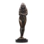 A CONTEMPORARY BRONZE SCULPTURE OF A SEMI DRESSED GIRL standing wrapped in a shawl, the base