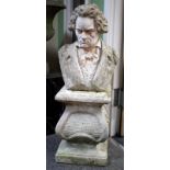 A COMPOSITE STONE BUST OF BEETHOVEN on a square plinth, overall 85cm in height