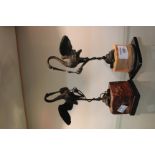 A NEAR PAIR OF 19TH CENTURY BRONZE SCULPTURES OF CRANES stood on the back of a turtle eating a