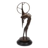 A CONTEMPORARY BRONZE SCULPTURE IN THE FORM OF A STYLISED ARCHER on a  turned marble base, 42cm high